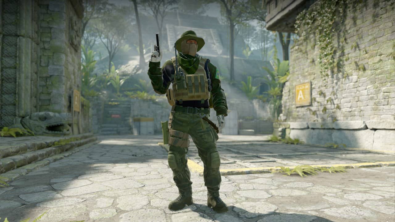 A CT agent raising a pistol among ancient stone ruins in Counter-Strike 2